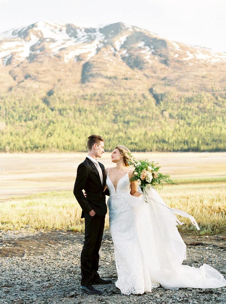 Bride and groom at their Alaska destination wedding at Eklutna Lake