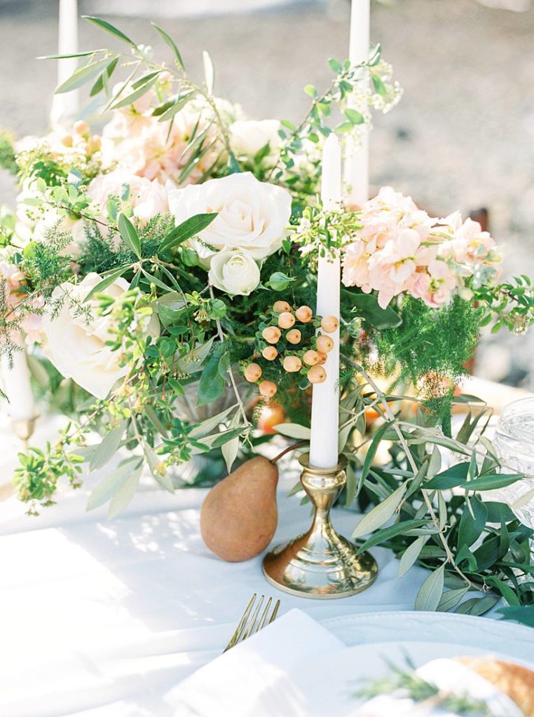 Wedding table center piece with soft romantic florals