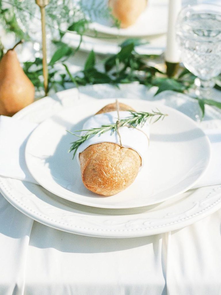 wedding place setting with rosemary wrapped loaf