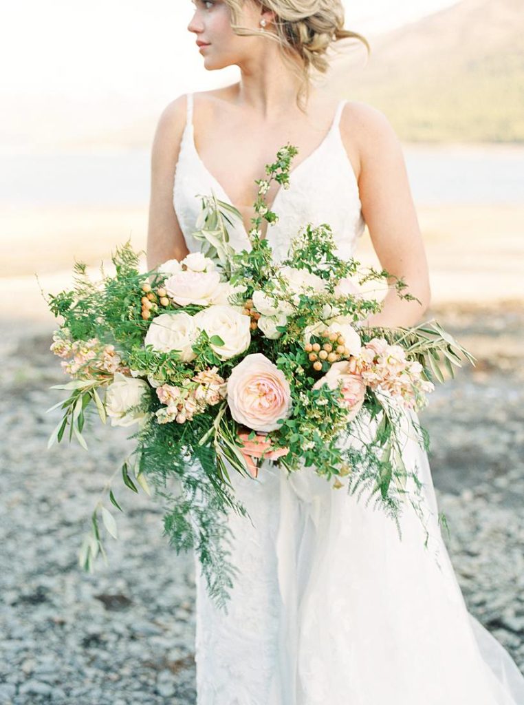 Bride with her soft floral bouquet